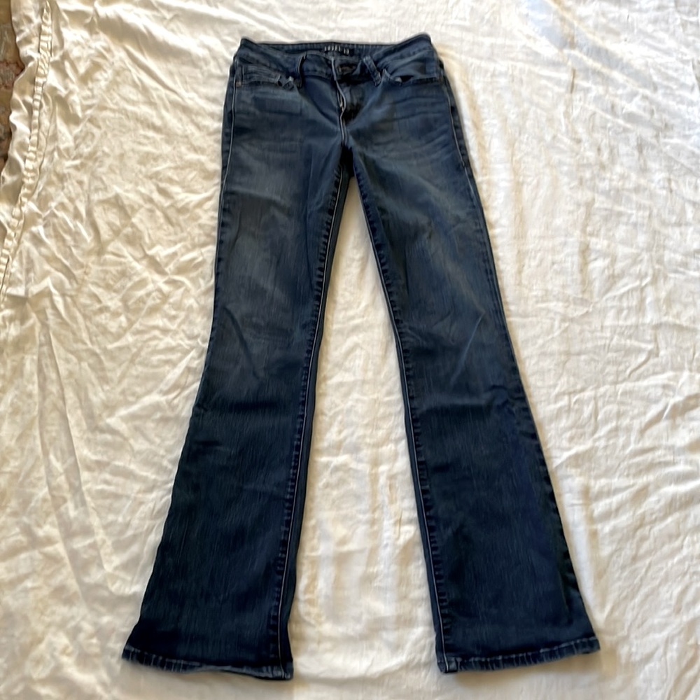 Women’s Level 99 boot cut indigo jeans, size 27.